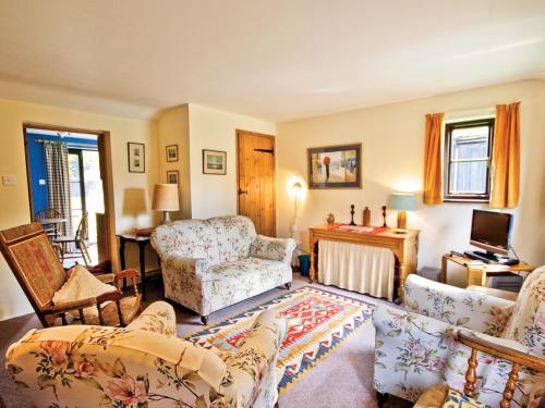 Ένα ή περισσότερα κρεβάτια σε δωμάτιο στο The Stables - E3491