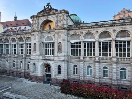 a large stone building with a lot of windows at Appartements Frank in Baden-Baden