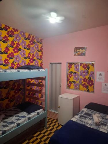 Ένα ή περισσότερα κρεβάτια σε δωμάτιο στο Hostel & Pousada UFPE INN