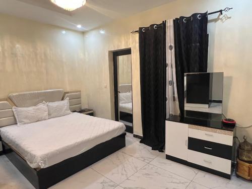 Ένα ή περισσότερα κρεβάτια σε δωμάτιο στο The ZipZak House comfort