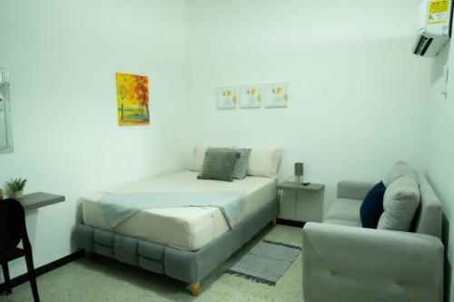 Ένα ή περισσότερα κρεβάτια σε δωμάτιο στο Casa Roosevelt