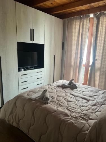 Ένα ή περισσότερα κρεβάτια σε δωμάτιο στο VILLA LIDO - Lake Como