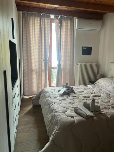 Ένα ή περισσότερα κρεβάτια σε δωμάτιο στο VILLA LIDO - Lake Como