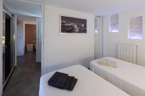 Ένα ή περισσότερα κρεβάτια σε δωμάτιο στο Gite SEINE EN VUE standing, panorama et climatisation