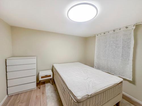 Ένα ή περισσότερα κρεβάτια σε δωμάτιο στο Aurora Bliss