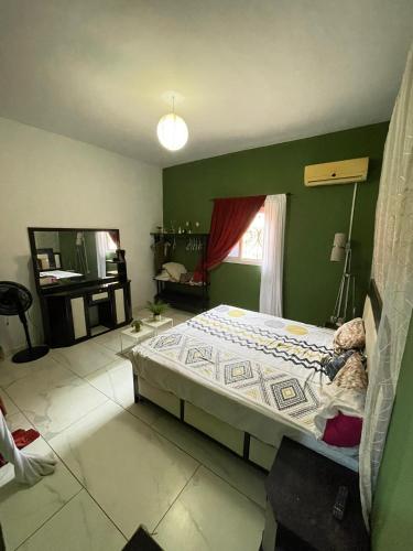 Giường trong phòng chung tại Khady