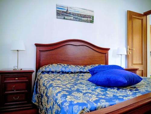 Ένα ή περισσότερα κρεβάτια σε δωμάτιο στο B&B Rivoli