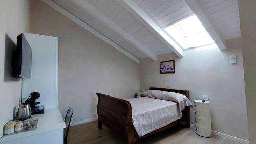 Ένα ή περισσότερα κρεβάτια σε δωμάτιο στο Il Cedro