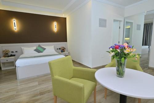 Postel nebo postele na pokoji v ubytování Liyu Hotel Apartment