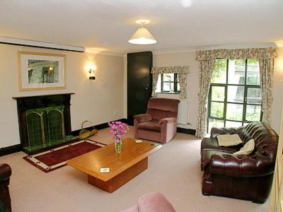 Posezení v ubytování The Stables Trap Farm