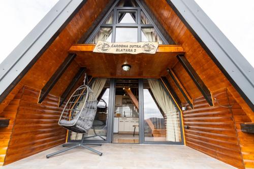 an entrance to a building with a sign on it at Čarobna jutra Zlatara 2 in Radijevići