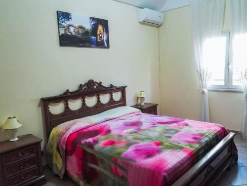 Postel nebo postele na pokoji v ubytování Villa Giovanna