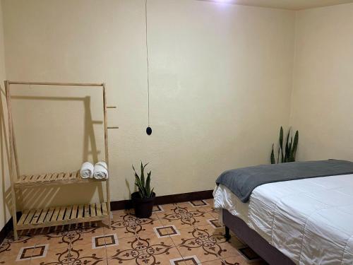 Ένα ή περισσότερα κρεβάτια σε δωμάτιο στο Residencia Aren 2