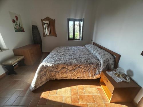 Postel nebo postele na pokoji v ubytování La Dimora di Sandra