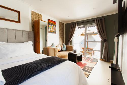 Ένα ή περισσότερα κρεβάτια σε δωμάτιο στο Caline VIP Luxury Jacuzzi &, Swimming Pool MEWS