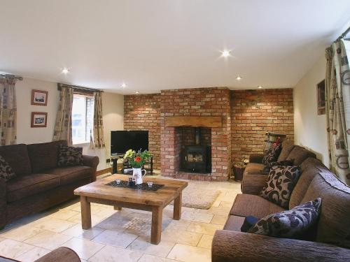 TV a/nebo společenská místnost v ubytování The Granary - Ijy