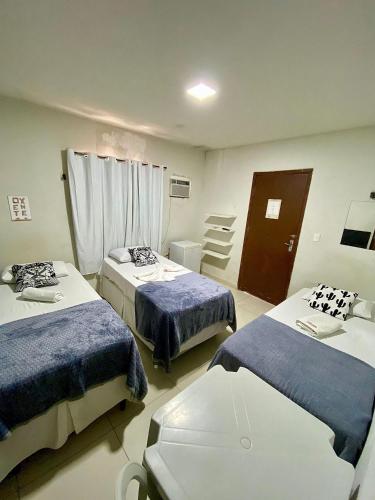 Ένα ή περισσότερα κρεβάτια σε δωμάτιο στο Pousada O auto da Compadecida