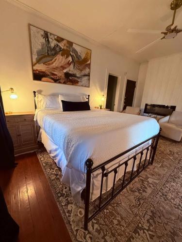 a bedroom with a large bed in a room at Peaceful Guest Suite with Microwave & Fridge in Lafayette