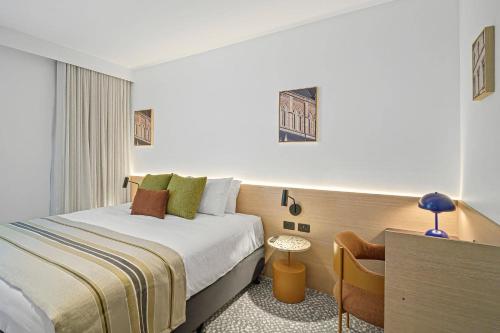 Postel nebo postele na pokoji v ubytování Urban Rest Hackney Hotel