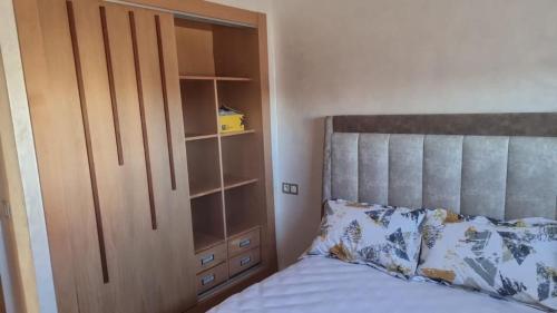 Ένα ή περισσότερα κρεβάτια σε δωμάτιο στο Appartement luxueux