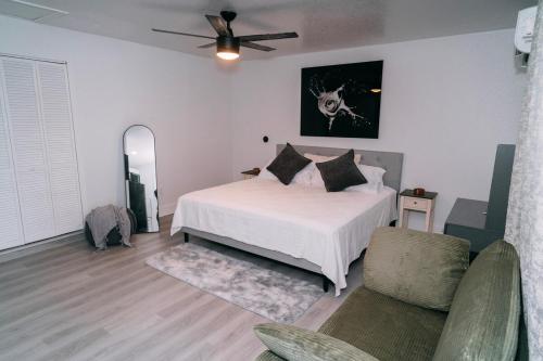 Ένα ή περισσότερα κρεβάτια σε δωμάτιο στο Tampa Escape