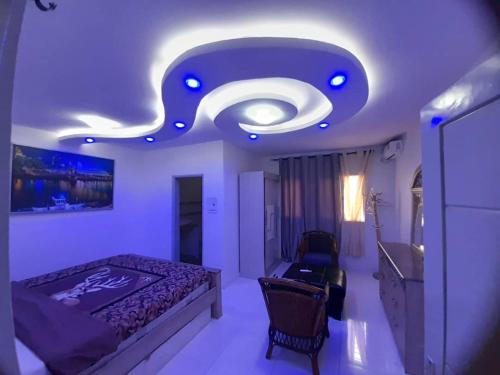 Ένα ή περισσότερα κρεβάτια σε δωμάτιο στο presti royal services