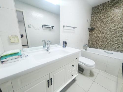 Koupelna v ubytování Capital International Home