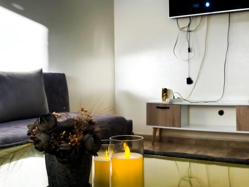 TV/trung tâm giải trí tại Superbe Appartement avec vue paronamique sur la plage Achakar - proche de Cap Spartel - Grottes Hercule