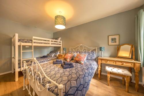 Ένα ή περισσότερα κρεβάτια σε δωμάτιο στο Certws-Y-Ffynnon