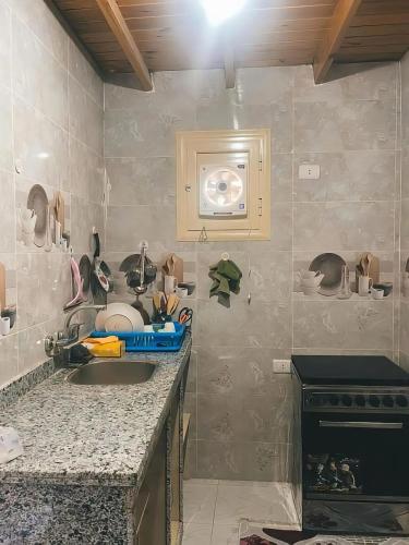 Kuchyň nebo kuchyňský kout v ubytování Lighthouse Seaview Studio