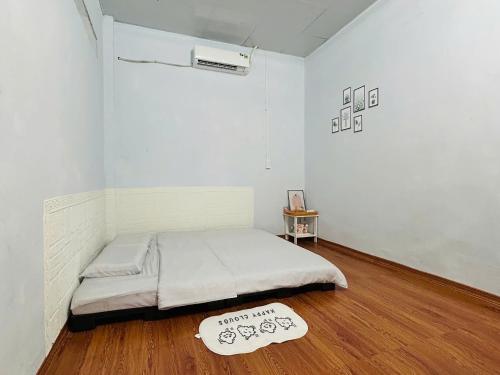 Postel nebo postele na pokoji v ubytování Annie Home