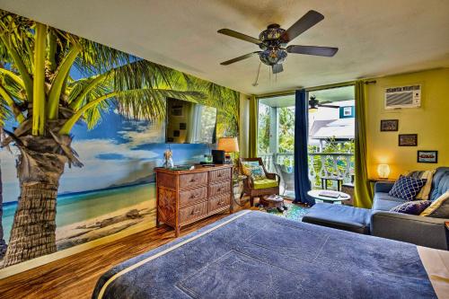 a bedroom with a palm tree mural on the wall at BLACK FRIDAY SALE NoW in Kailua-Kona
