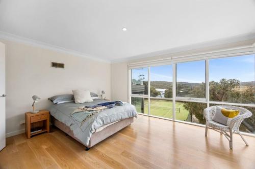 Ένα ή περισσότερα κρεβάτια σε δωμάτιο στο Rally House Fairhaven