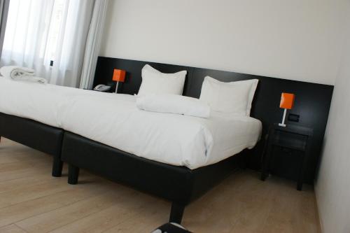 Cama o camas de una habitación en Hotel Aniene