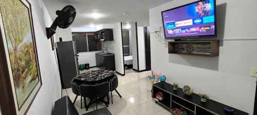 Kuchyň nebo kuchyňský kout v ubytování VACACIONES CON AROMA DE CAFÉ - Apartamento Vacacional cerca a Parque del Café