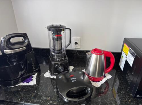 Koffie- en theefaciliteiten bij Brisa do Sol Apartment 201 - Piratuba SC