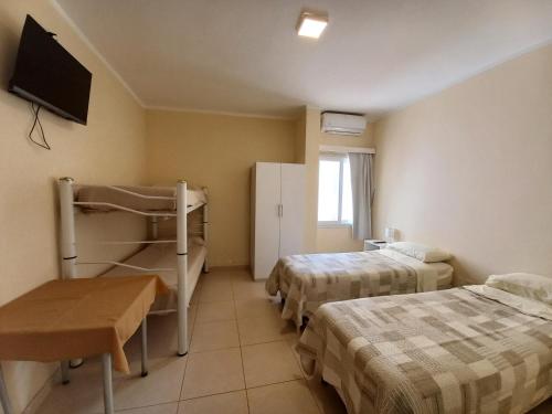 Ένα ή περισσότερα κρεβάτια σε δωμάτιο στο Hotel Valle Hermoso