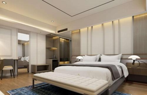 Postel nebo postele na pokoji v ubytování Arkadewi Boutique Hotel Prawirotaman