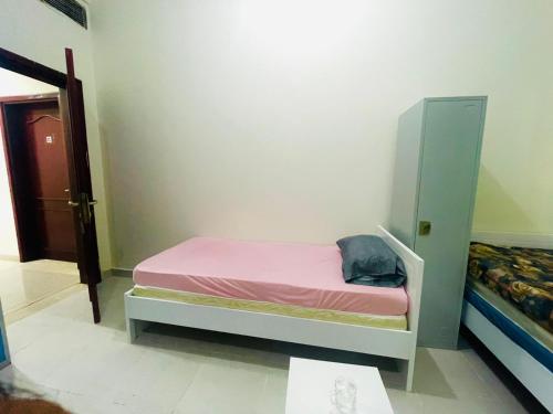 Postel nebo postele na pokoji v ubytování AG DORMS and BUNKS