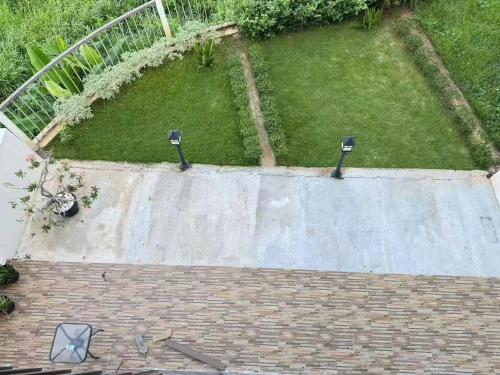 an aerial view of a garden with a lawn at sea l in Jakarta