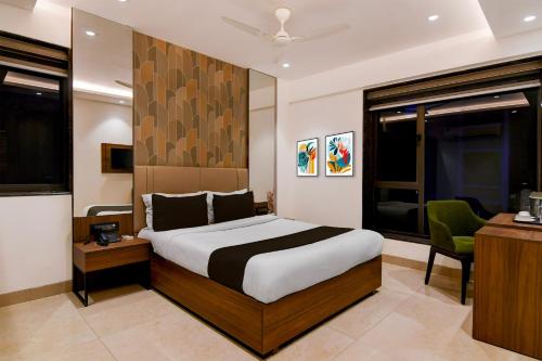 Postel nebo postele na pokoji v ubytování Super Townhouse Oak DLF Newtown Bus Terminal