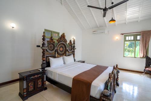 Ένα ή περισσότερα κρεβάτια σε δωμάτιο στο Amara Chairmans Bungalow