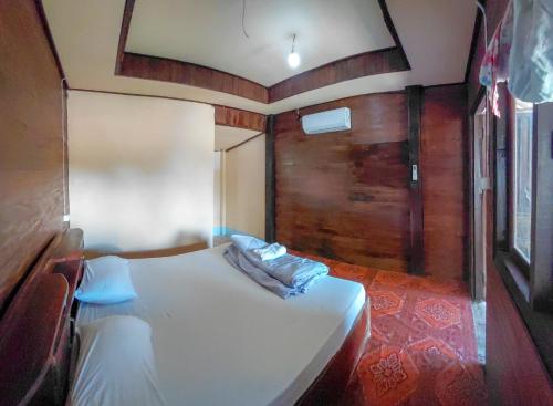 Ένα ή περισσότερα κρεβάτια σε δωμάτιο στο Mama Mon & Papa's