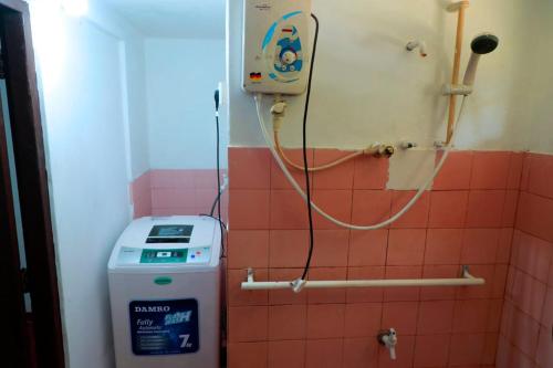 Koupelna v ubytování WindGet Villa