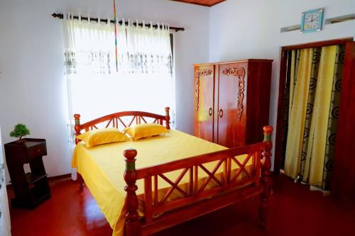 Postel nebo postele na pokoji v ubytování WindGet Villa