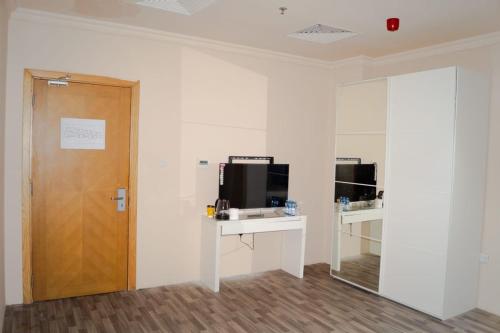 TV a/nebo společenská místnost v ubytování Travel inn