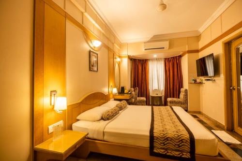 Postel nebo postele na pokoji v ubytování Pai Viceroy