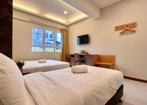 Ένα ή περισσότερα κρεβάτια σε δωμάτιο στο Swing & Pillows - TRX