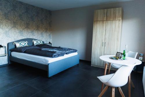 Postel nebo postele na pokoji v ubytování Ferienwohnung Empt Vussem