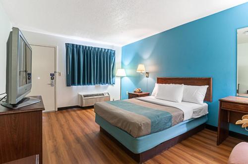 Ένα ή περισσότερα κρεβάτια σε δωμάτιο στο Motel 6-Southgate, MI - Detroit